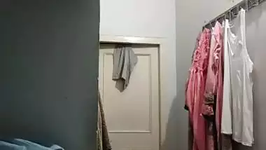 Mom changing dress caught on camera by horny son
