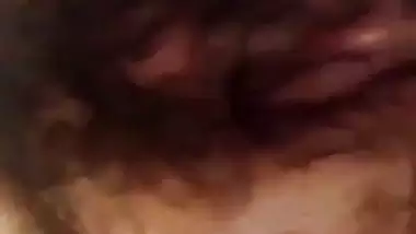Indian girl nude MMS of a girl fingering her hairy pussy