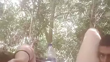 Mistress lets her servant lick her pussy during outdoor sex